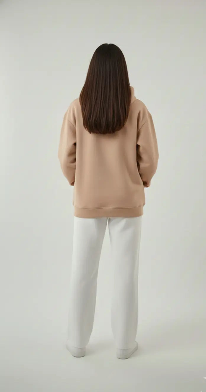Back fit of The Dune Hoodie on female model - showing oversized silhouette and length
