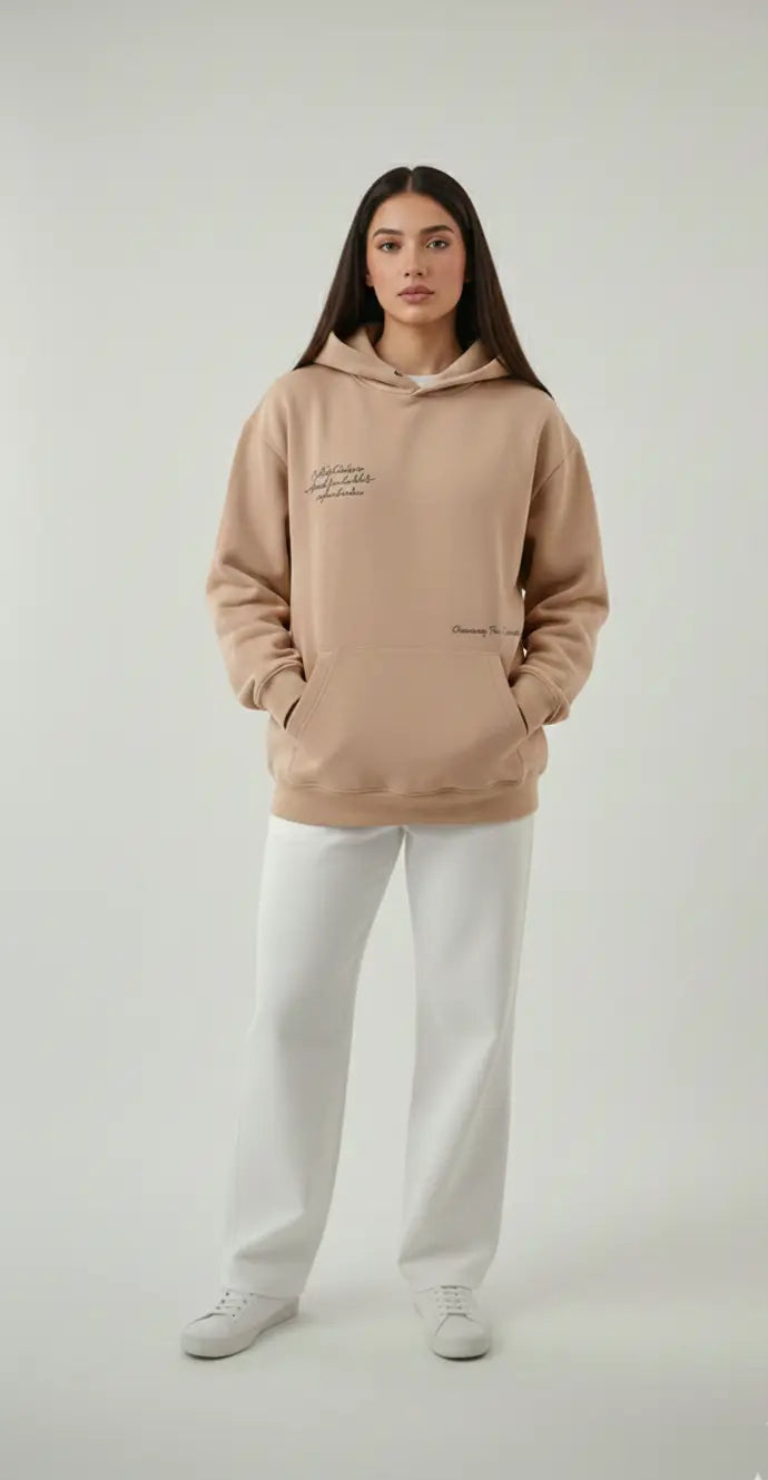 Female model styling The Dune beige oversized hoodie - women's streetwear look in Pakistan
