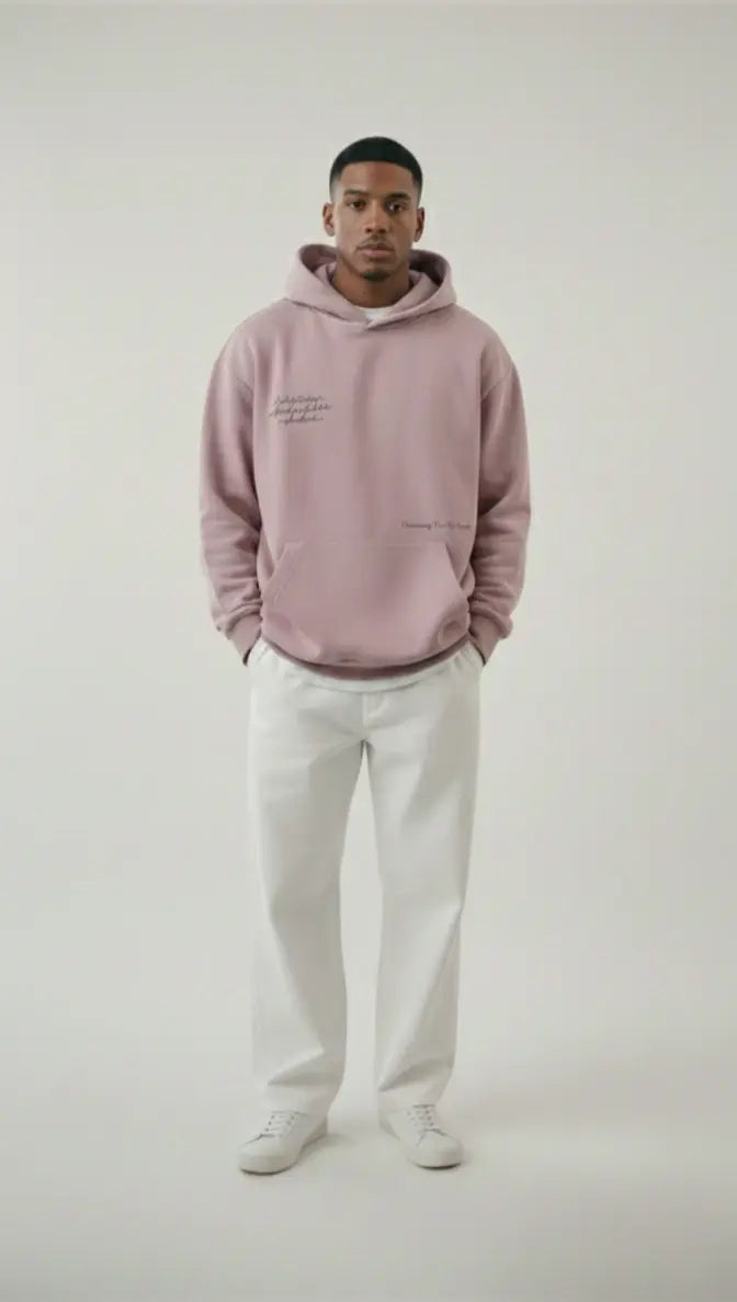 A young man  wearing the Lalic lavender unisex hoodie from the front, showcasing the cozy fit and soft fabric for both genders.

